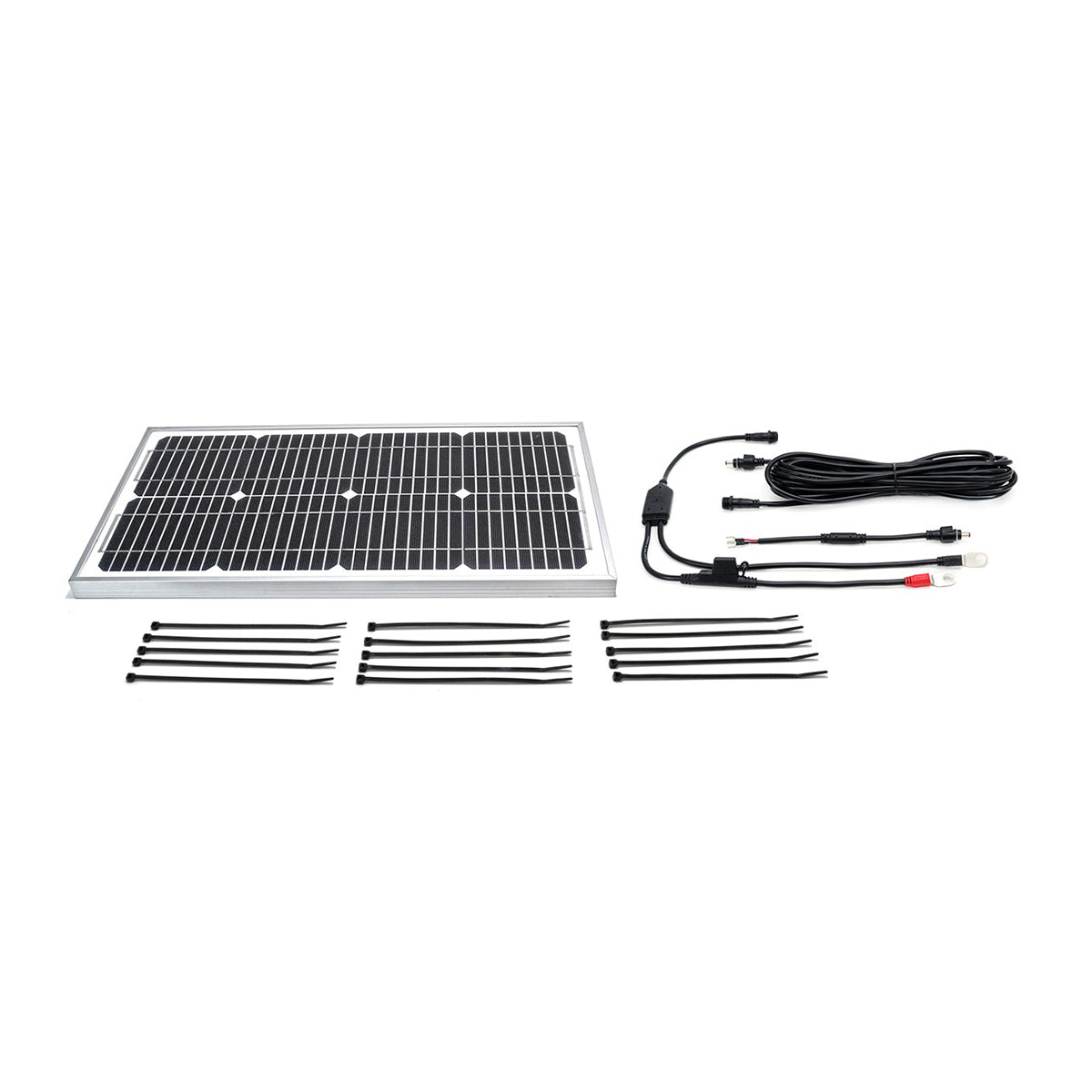 Solar panel kit with cables and connectors on a white background