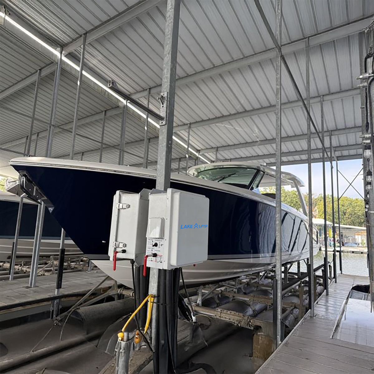 Boat on a lift inside a covered storage area