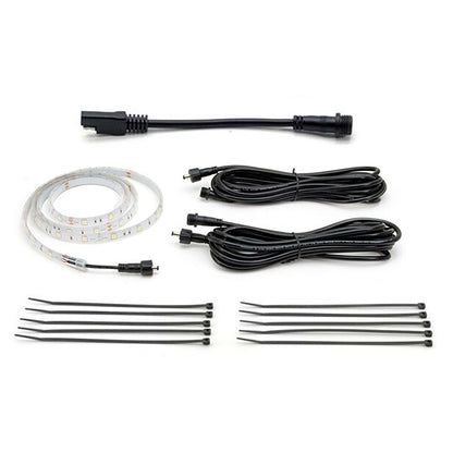 Set of LED strip lights, connectors, and cables on a white background