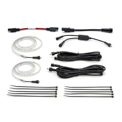 Set of LED strip lights and connectors on a white background