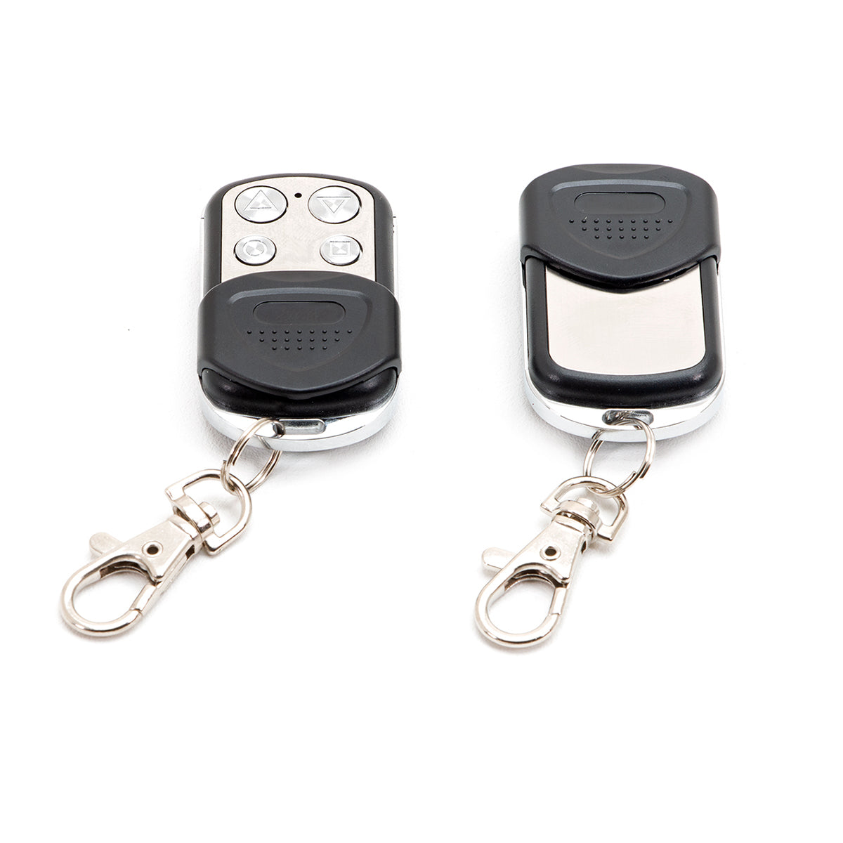 Two black remote controls with keychains on a white background